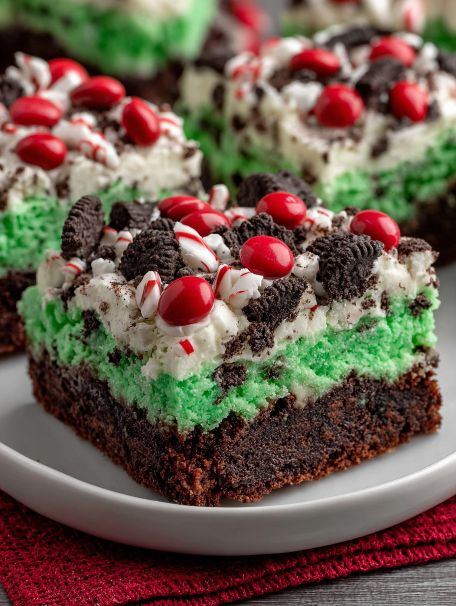 A piece of cake with red and white decorations.