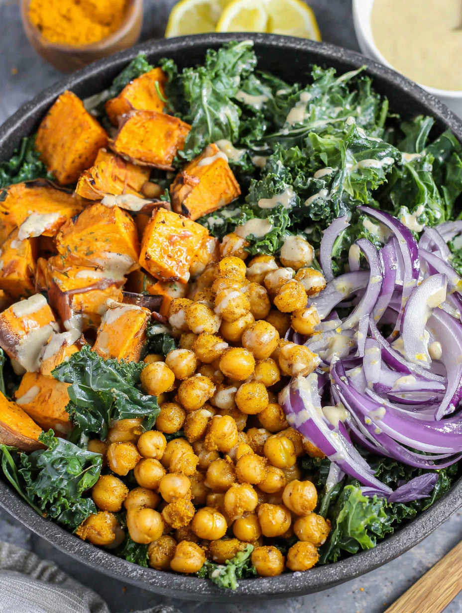 A bowl of vegetables including onions, carrots, and beans.