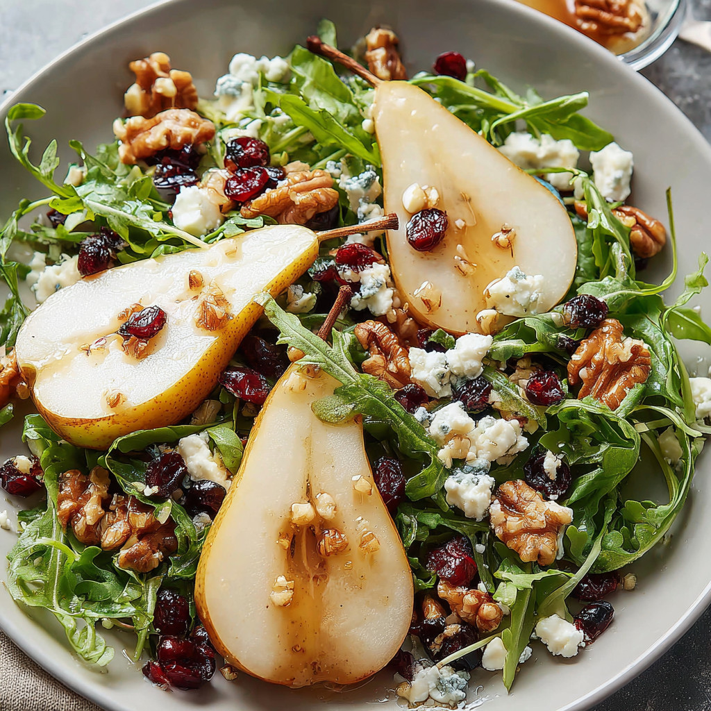 A bowl of salad with a slice of apple and walnut.