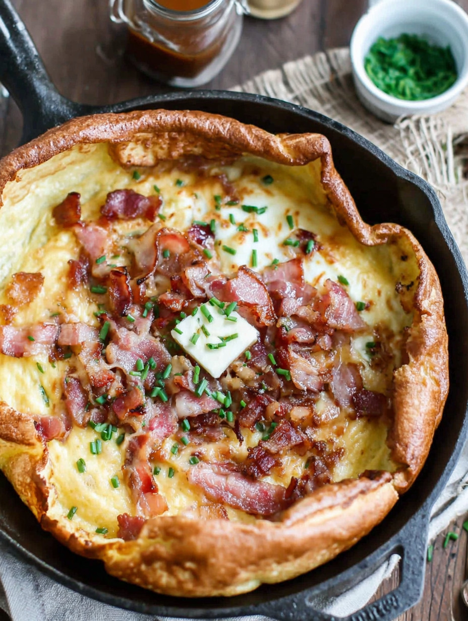 A fried egg with bacon and cheese.